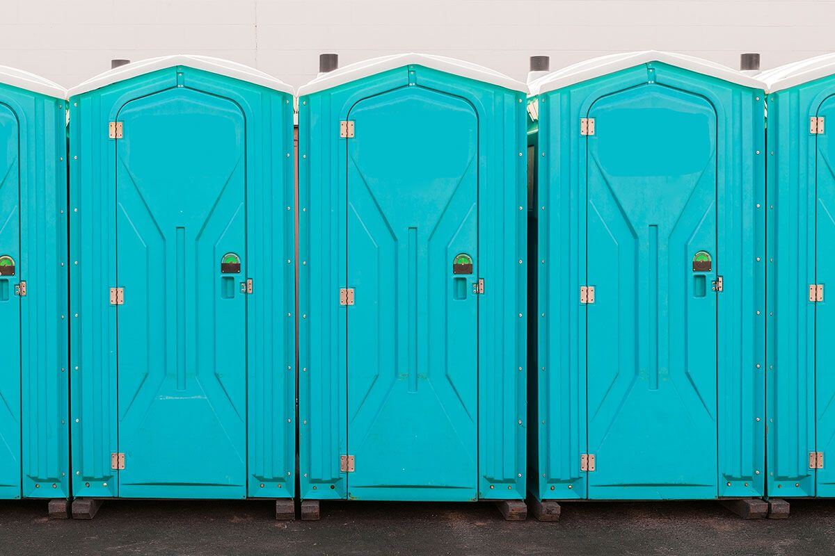 Industrial portable restroom units at a plant in Cuyahoga Falls, Ohio